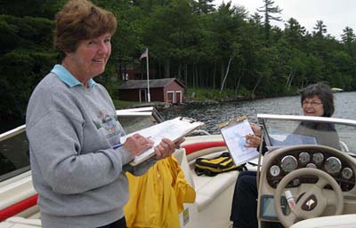 Volunteers Reen Maslak and Maggie Shannon on Long Pond
